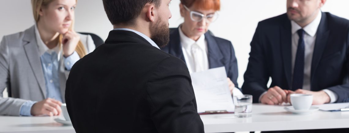 Shot of recruiters talking with a job applicant